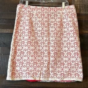White lace skirt with unique orange/pink under layer